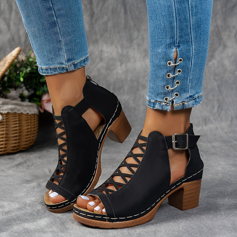 Lotus women's cushioned adjustable sandal in black, side profile showing sleek strap and lattice heel