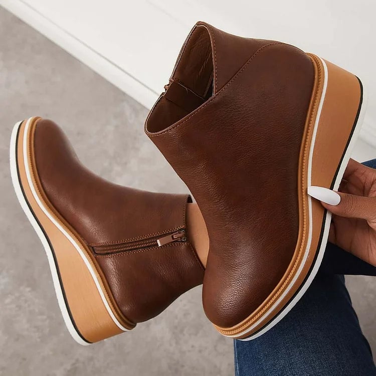 Lucille dark brown boots styled with a casual knit sweater and leggings