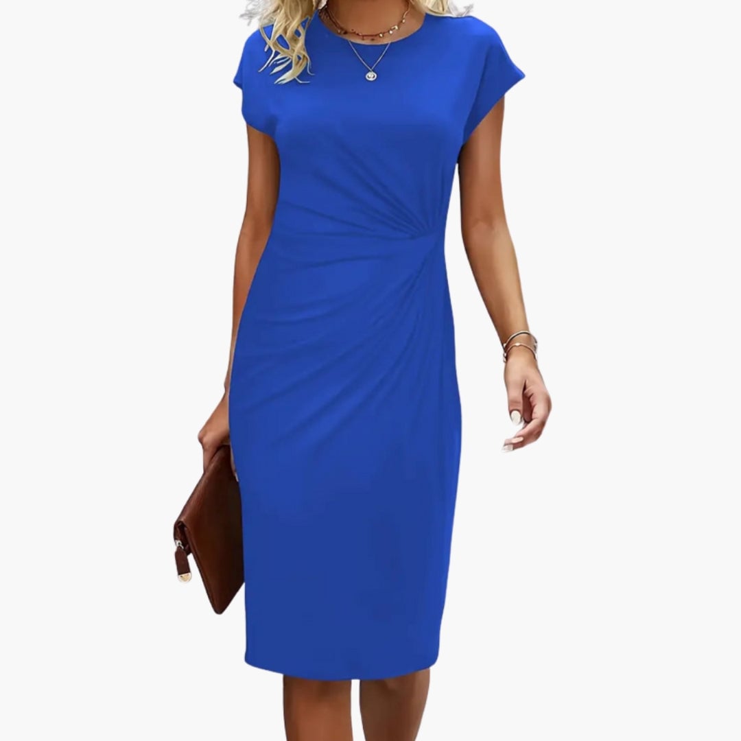Side profile of Lucille midi dress highlighting the fitted waist seam detail