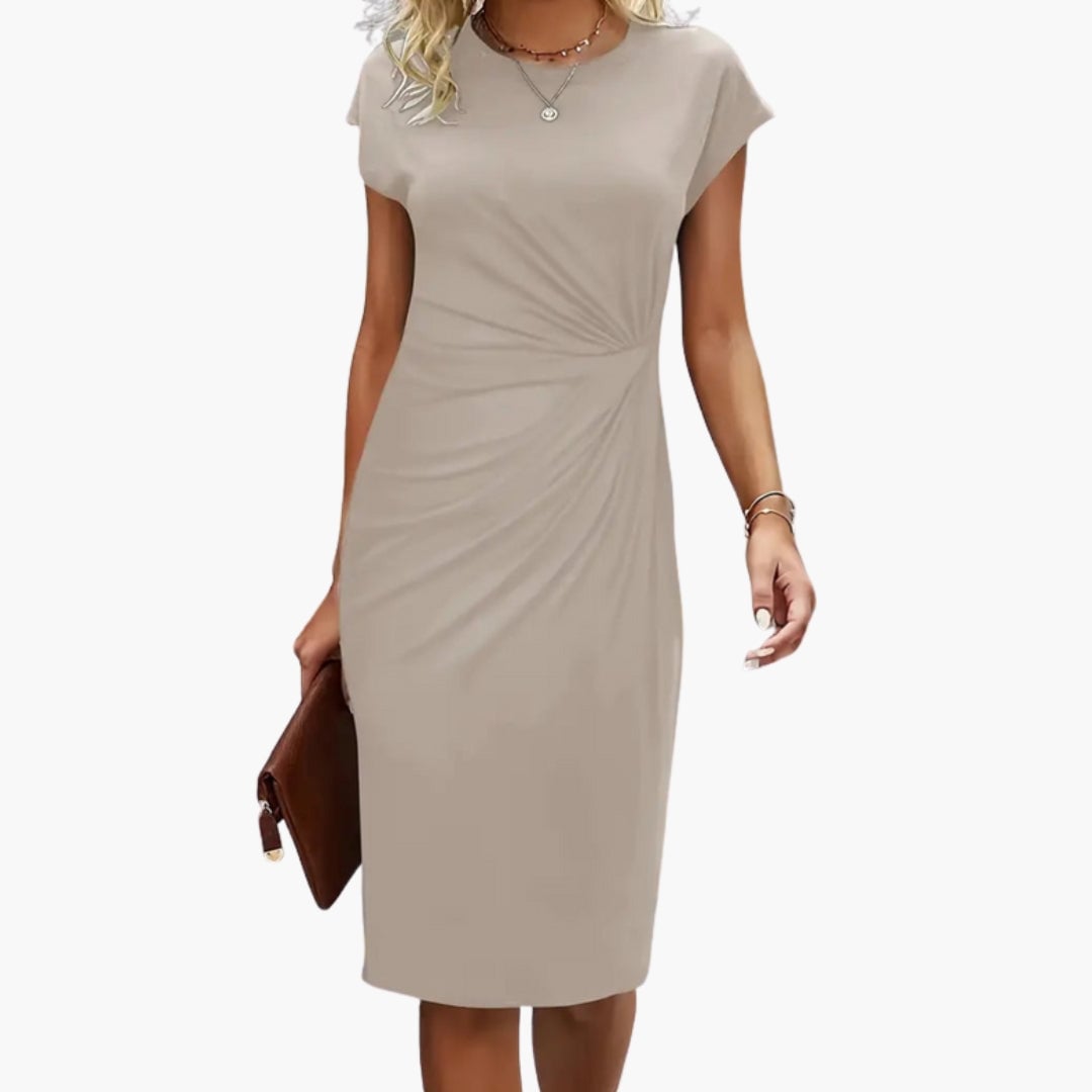 Close-up of Lucille midi dress fabric and fitted waist detail