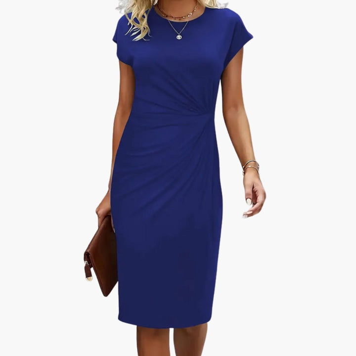 Lucille midi dress in navy blue, styled for a smart-casual office outfit