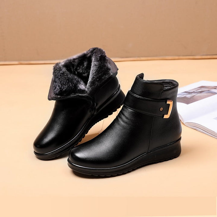Front view of Lucy black anti-slip women's boot with padded collar and textured outsole