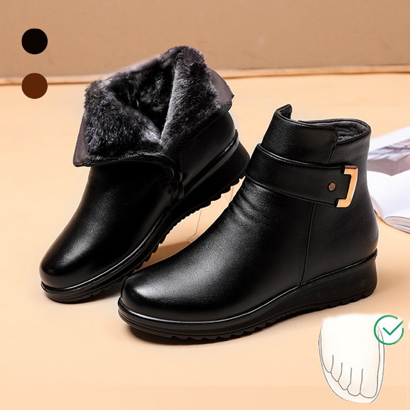 Side profile of Lucy black comfort boot showing cushioned interior and non-slip sole