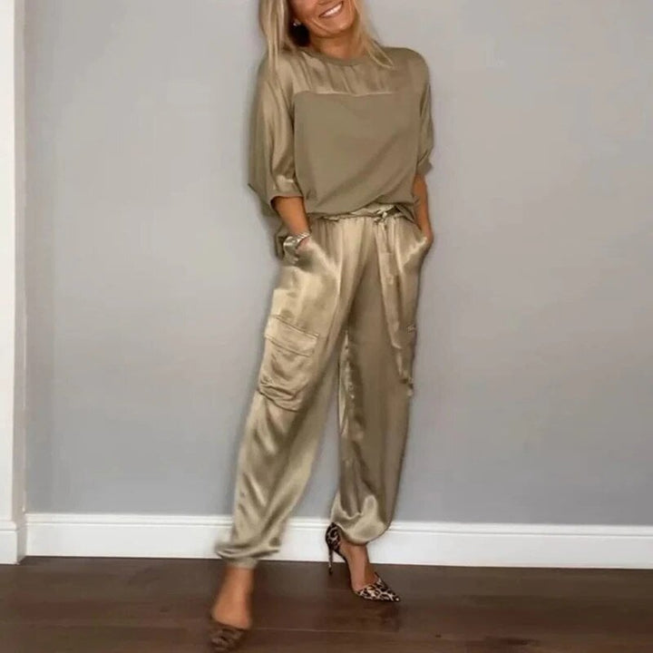 Model wearing the Luna relaxed clothing set in a neutral colorway, showing the relaxed fit silhouette from the front