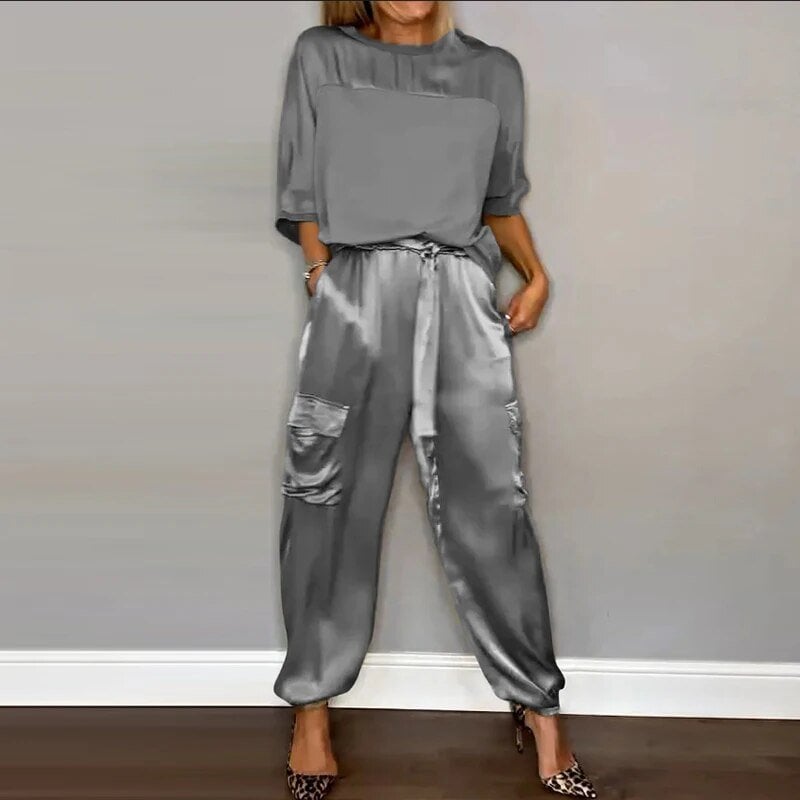 Luna relaxed clothing set flat lay showing available color options including Gold, Blue, Black, Grey, and White