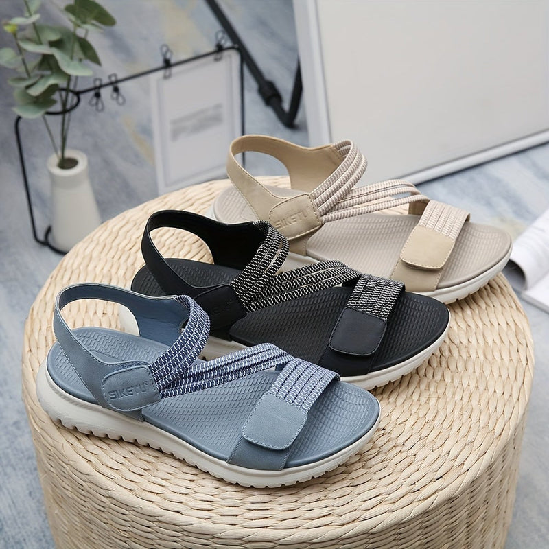 Luna sandal in black, top-down view highlighting arch support footbed
