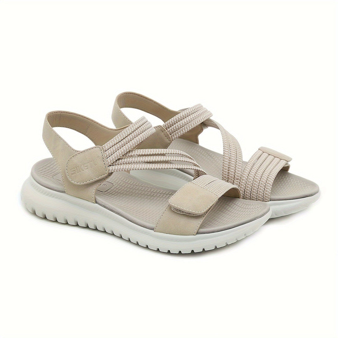 Luna sandal in apricot, top-down view highlighting soft color and footbed