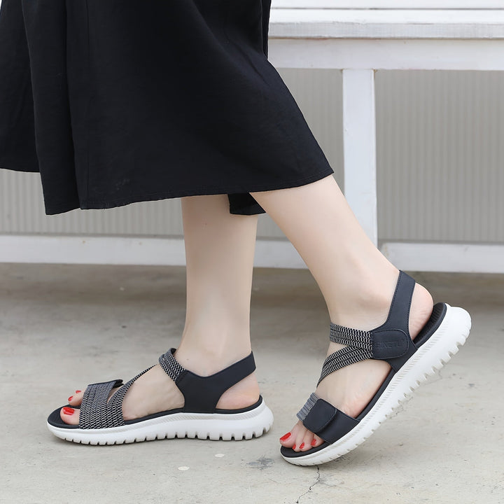 Luna sandal styled with linen cropped pants, casual daytime look