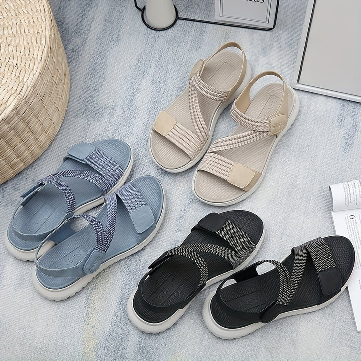 Pair of Luna sandals in black and apricot side by side for color comparison