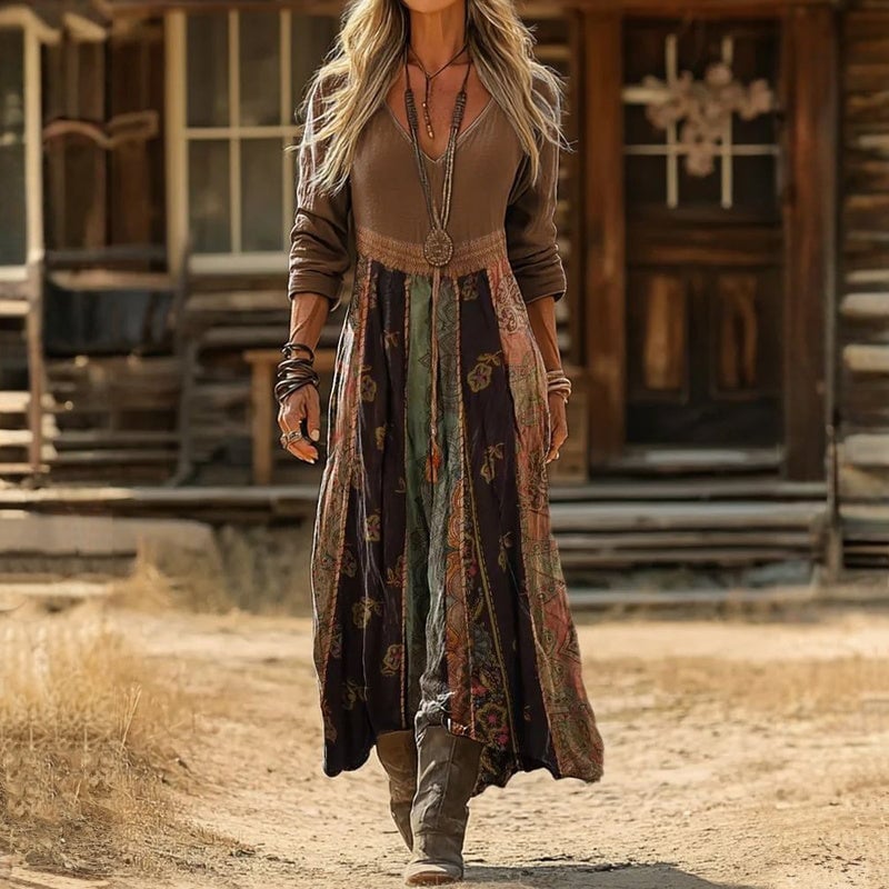 Woman wearing the Luna boho maxi dress in a multicolor patchwork floral print with long sleeves and a V-neckline