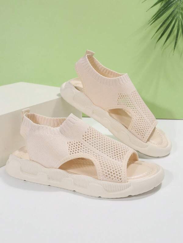 Close-up detail of the knit upper texture on the Luna sandal in black