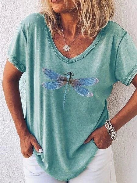 Close-up of the dragonfly chest graphic on the Luna women's casual tee