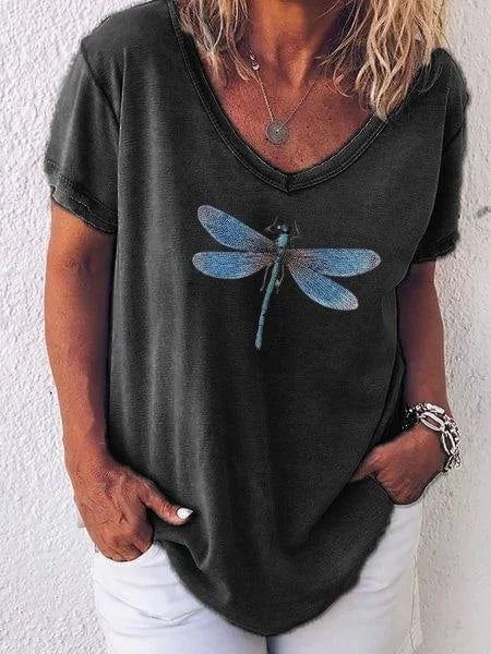 Luna dragonfly tee styled with jeans, shown in multiple available colors
