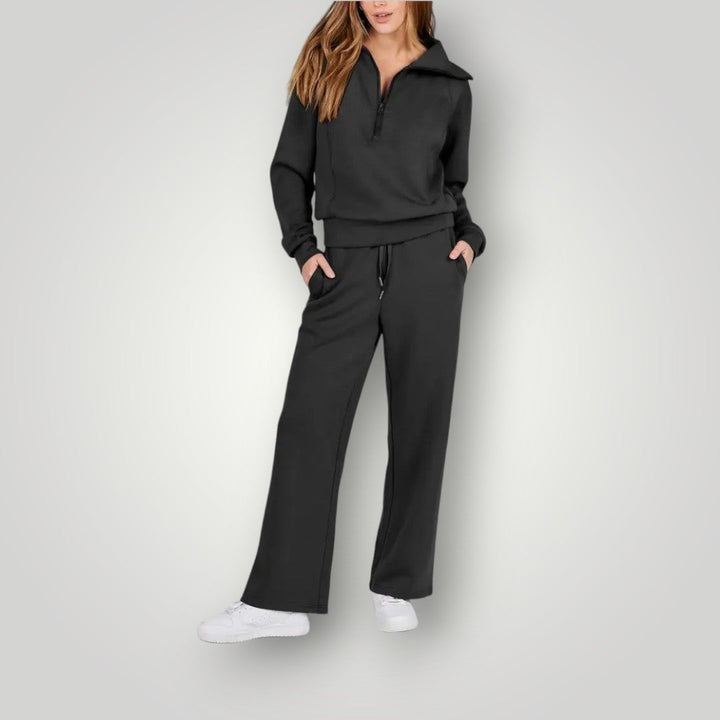 Woman in the Luna wide-leg sweatpants and half-zip top in beige, relaxed casual style