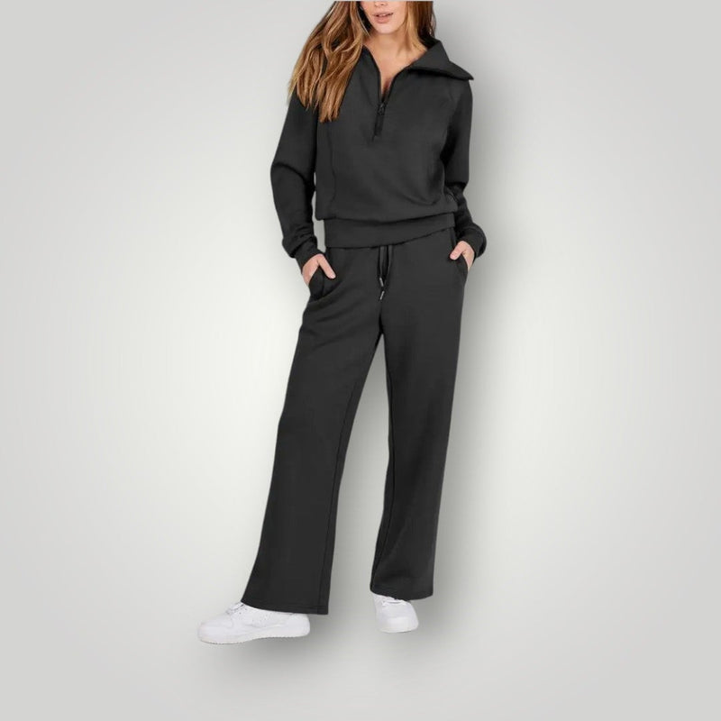 Woman in the Luna wide-leg sweatpants and half-zip top in beige, relaxed casual style