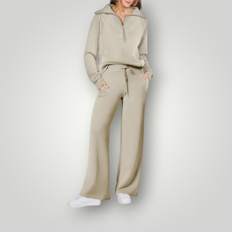 Full-length side view of the Luna loungewear set showing the wide-leg pants silhouette in light gray