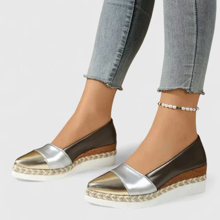 Rear view of Luna espadrille wedge loafers showing braided rope heel detail