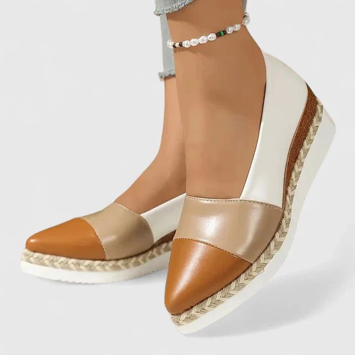 All three colorways of Luna espadrille wedge loafers — dark gold, black, and cream — displayed together