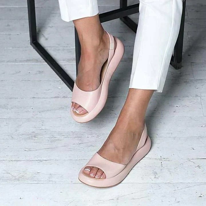 Luna peep toe slingback flat sandal in pink with cushioned sole, front view
