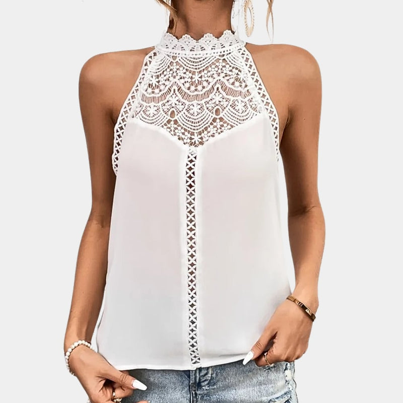 Close-up of the intricate crochet lace yoke detail on the Luna halter top in purple