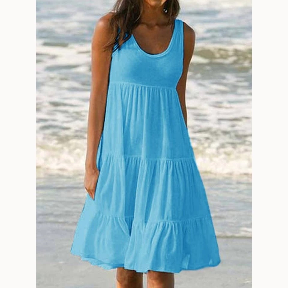 Luna sleeveless midi dress in rose red with cascading ruffle tiers, styled for a summer evening out