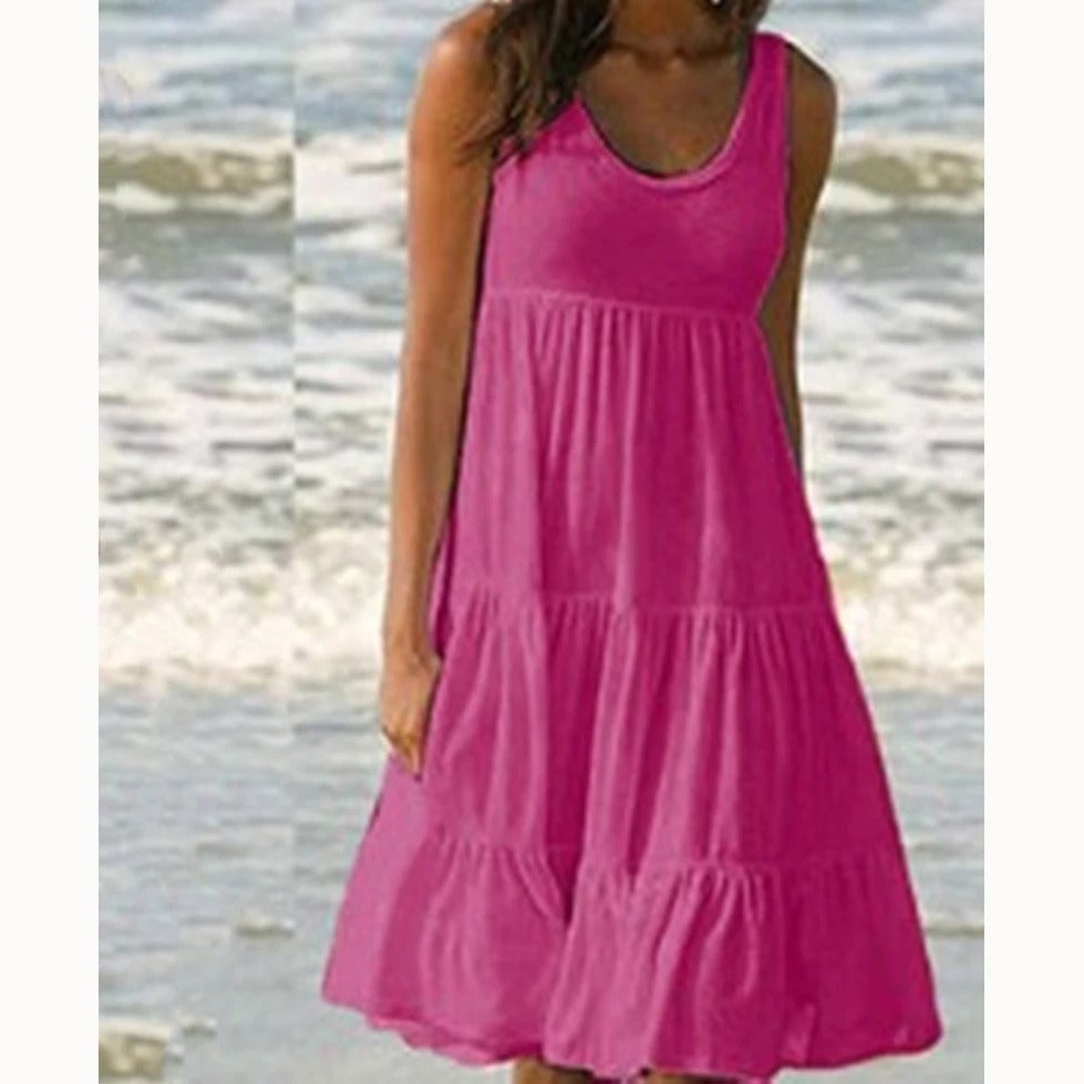 Model in the Luna boho midi dress in light blue, demonstrating the flattering flare and relaxed fit