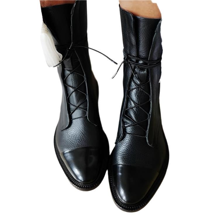 Front view of Luna heeled boots in black with a slim heel and polished finish