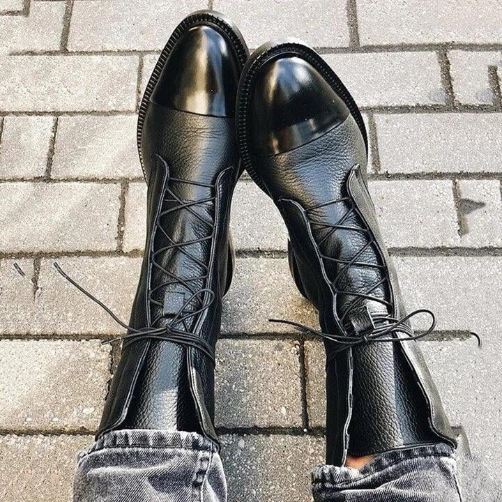 Side profile of Luna heeled boots showing sleek silhouette and stable heel