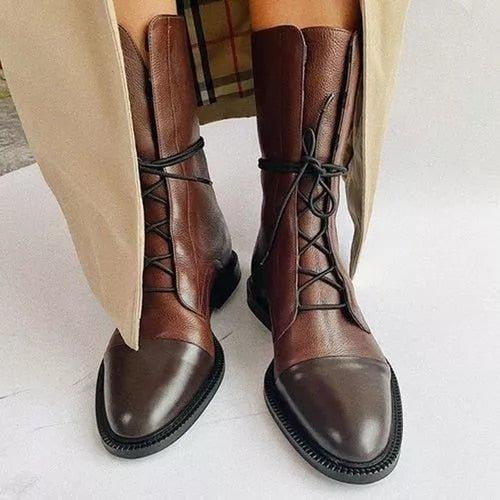 Luna heeled boots in brown displayed on a neutral background