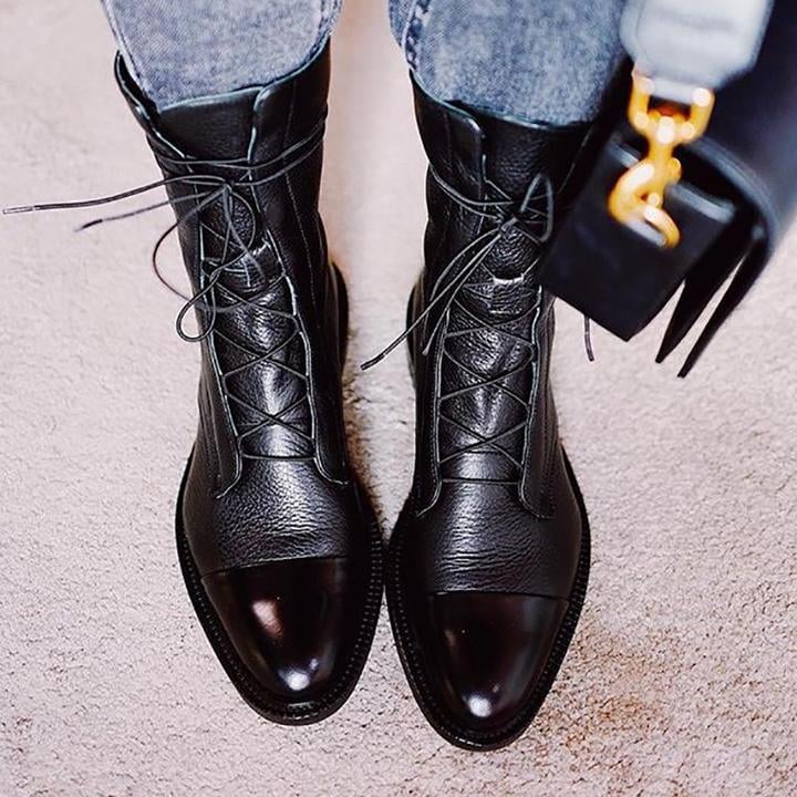 Pair of Luna heeled boots styled with dark jeans for a casual chic look