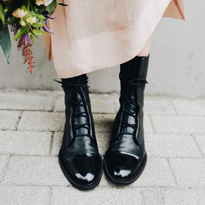 Luna heeled boots in black shown from a three-quarter angle