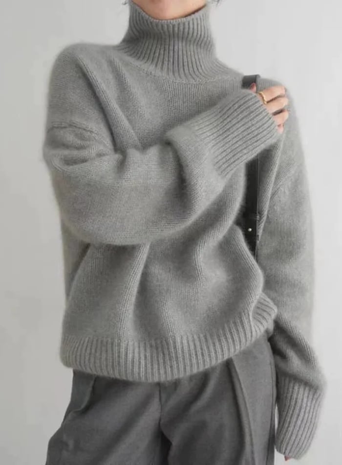 Camel brown turtleneck sweater laid flat showing the one-size silhouette