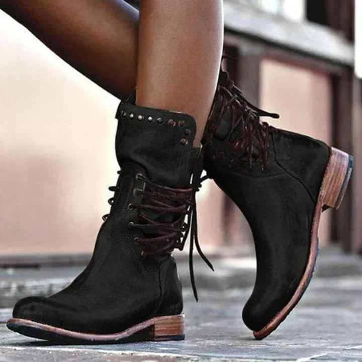 Luth leather boots styled with jeans, showcasing the leg-lengthening effect and sleek design