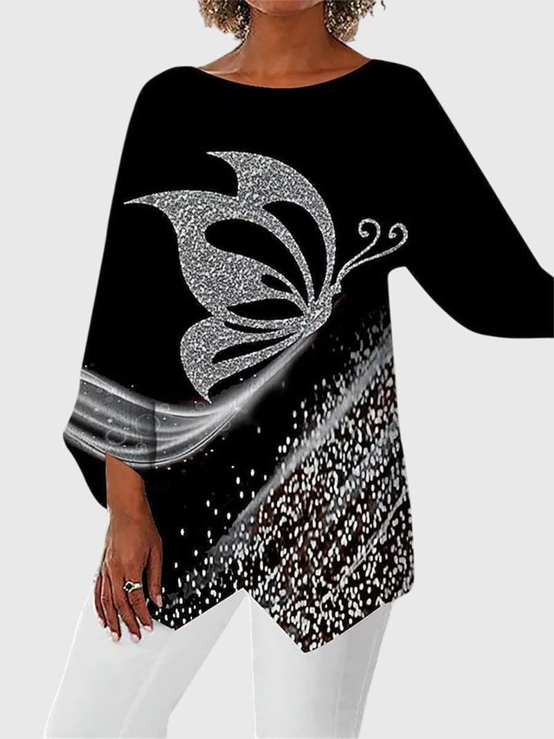 Front view of women's butterfly print asymmetric hem top with shimmering motif and round neckline