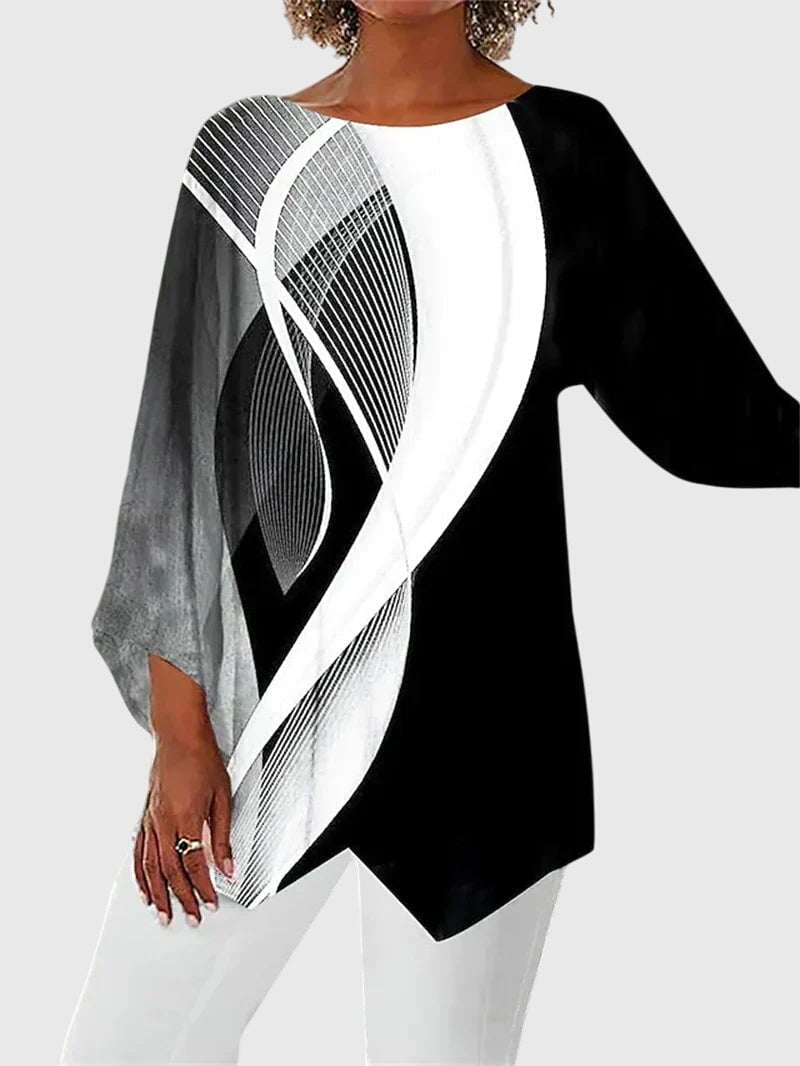 Back view of women's asymmetric hem butterfly print top