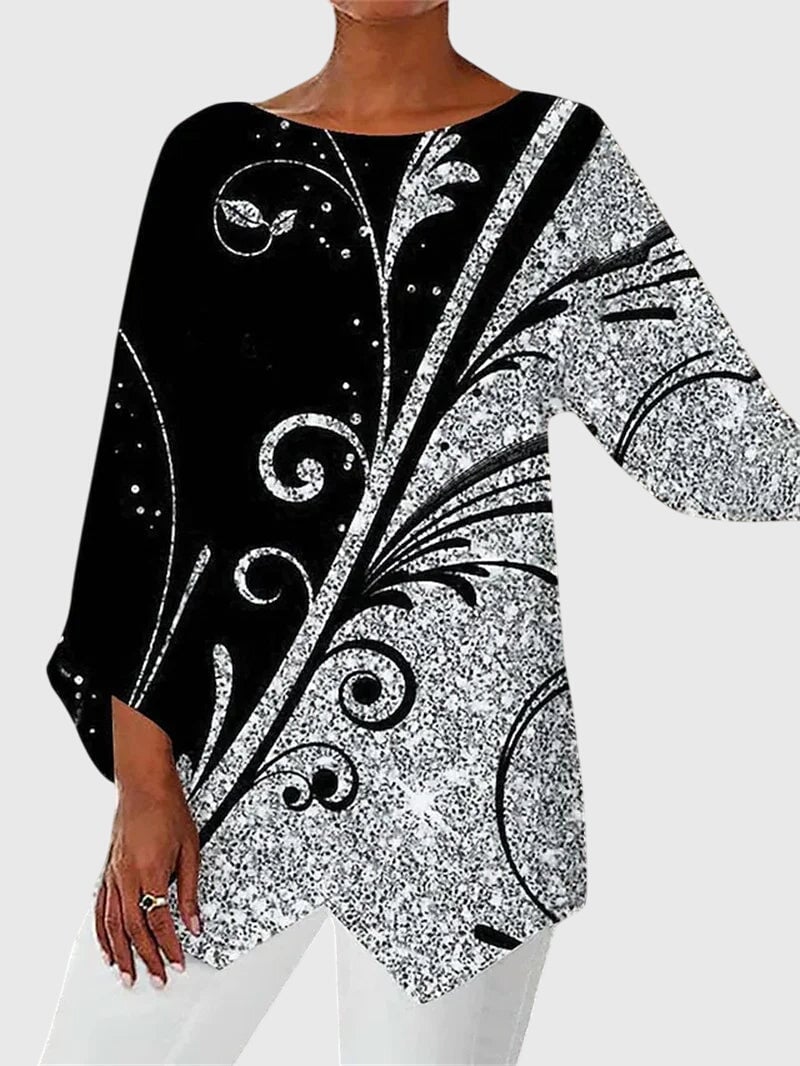 Detail shot of 3/4 sleeve and neckline on women's butterfly print top