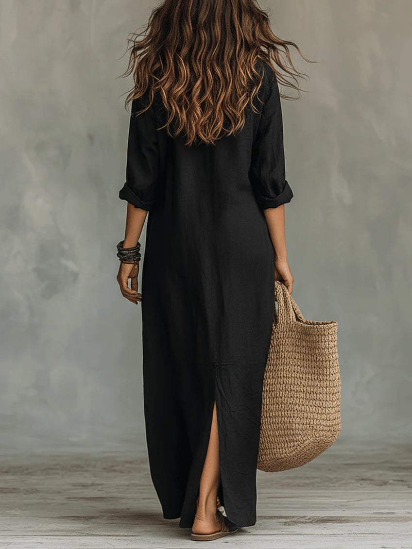 Side view of the Lydia long sleeve maxi dress highlighting the floor-length silhouette