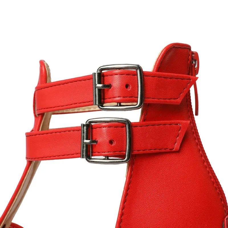 Close-up of the cushioned insole and platform base of the Lynette sandals in red