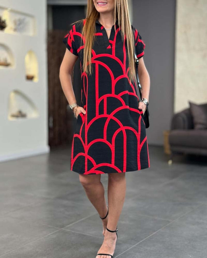 Front view of the Lynn midi dress highlighting the flattering waist and feminine cut