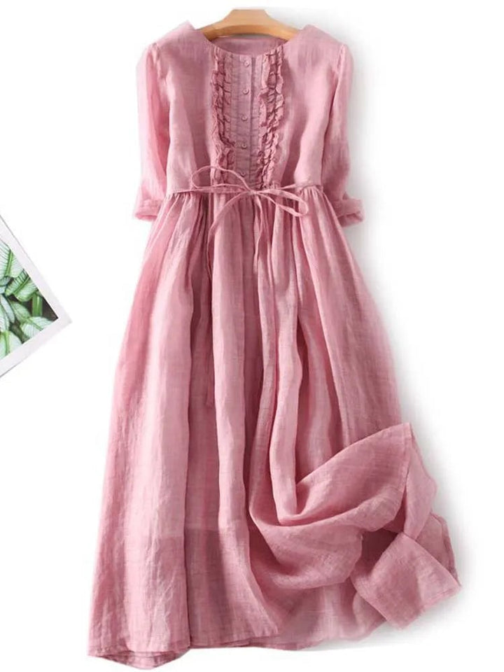 Side profile of the Madeleine vintage-inspired dress in white, highlighting its breezy lightweight fabric