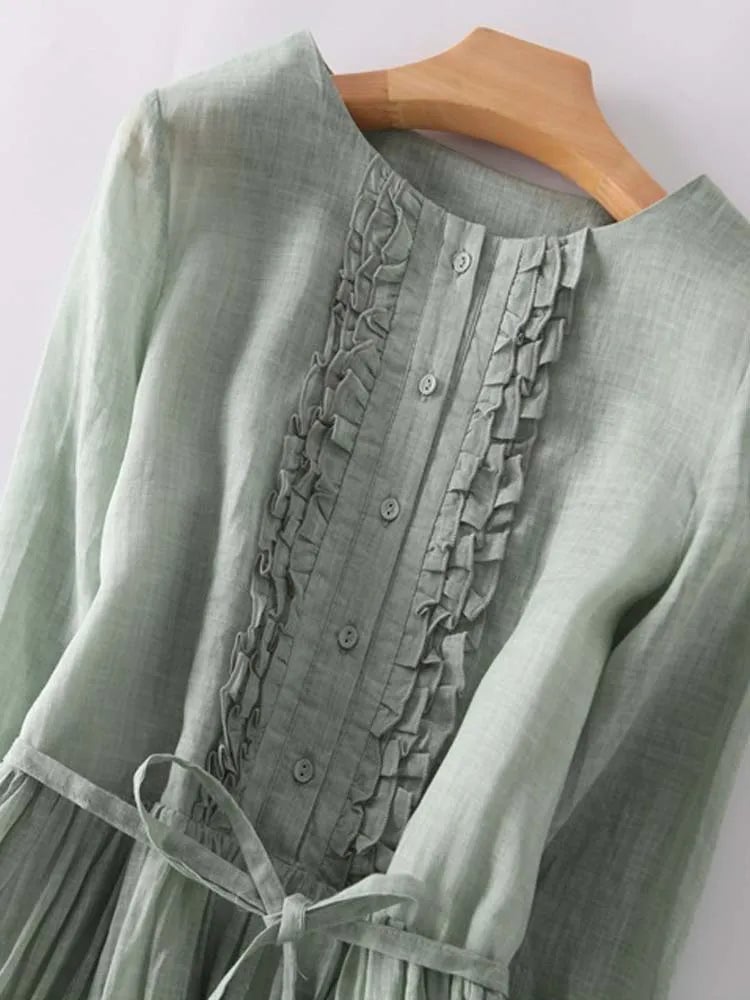 Close-up detail of the Madeleine vintage-inspired dress showing romantic vintage-style detailing