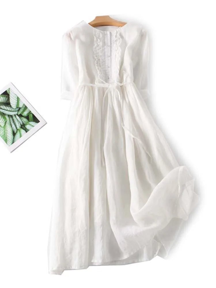 Flat lay of the Madeleine vintage-inspired dress in pink and white color options