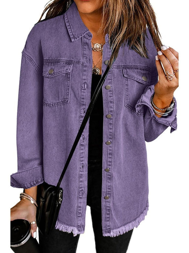 Back view of relaxed-fit denim jacket showing classic wash and clean seam detailing