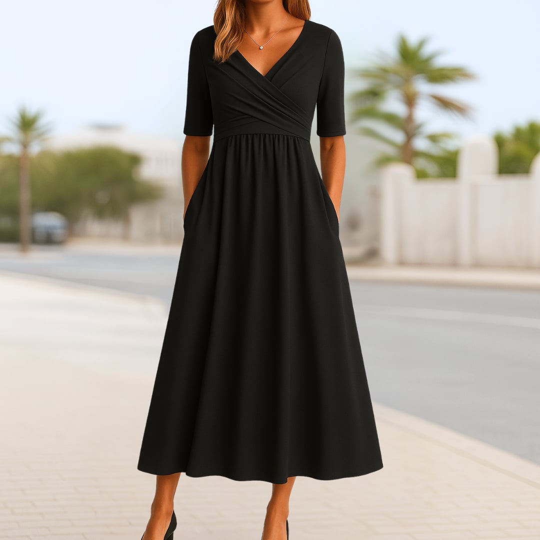 Close-up detail of the crossed bodice and soft fabric on the Madeline short-sleeve dress