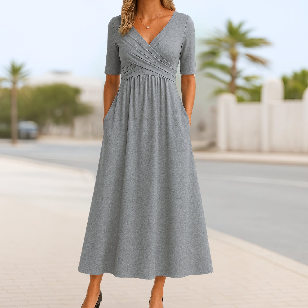 Side view of the Madeline crossed dress showing the A-line skirt and relaxed fit through the hips