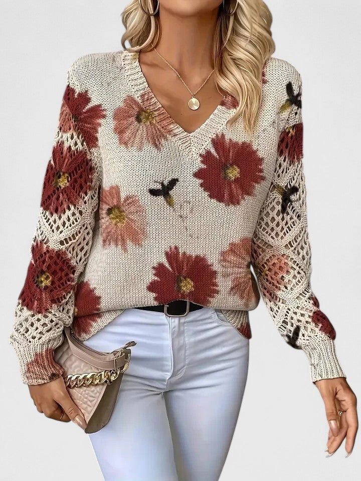 Close-up of floral pattern detail on a women's lightweight knit sweater