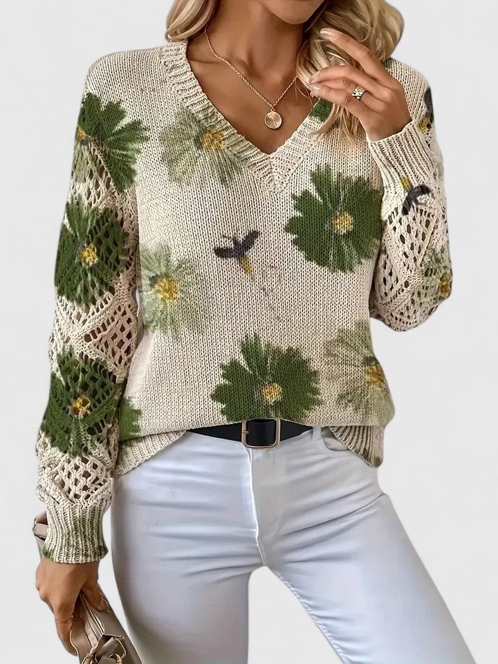 Front view of women's floral sweater in red showing full silhouette
