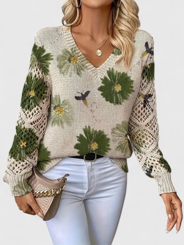 Overhead flat lay of women's elegant floral sweater showing color options