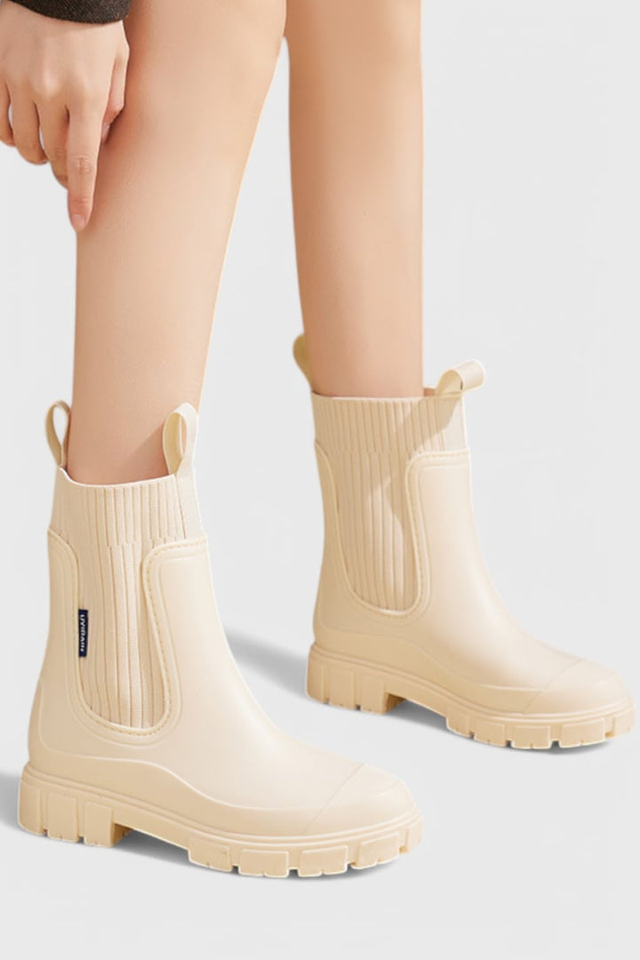 Maelie waterproof Chelsea boots in beige, side view on clean background