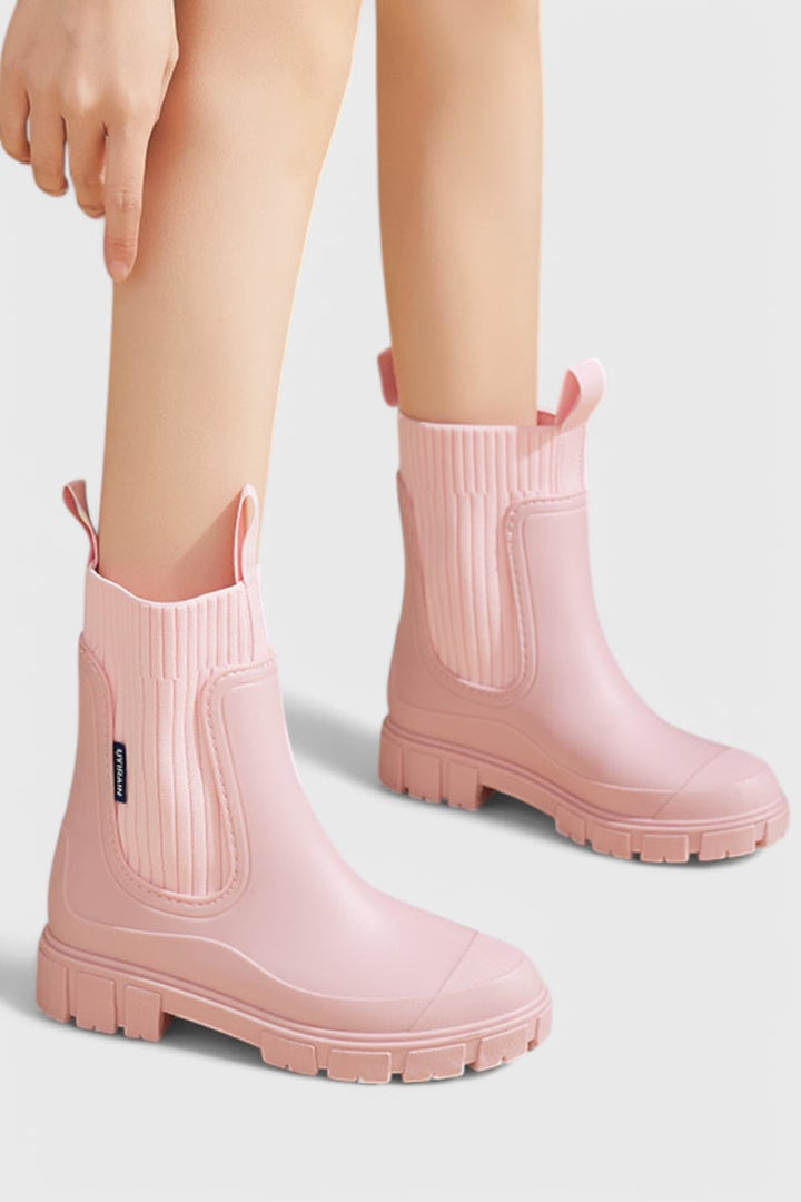 Maelie waterproof Chelsea boots worn with a midi dress, lifestyle shot